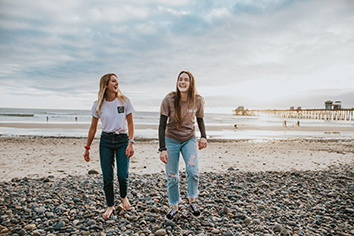 two girls laughing