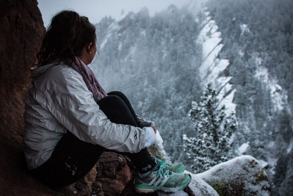 Girl looks out in winter, be present, be mindful, just be, being present.